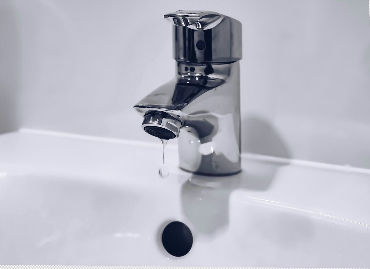 Example photo of a dripping faucet for a quote